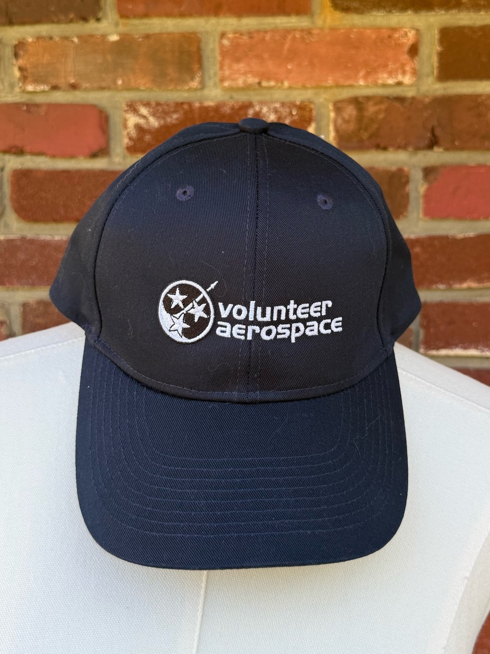 Volunteer Aerospace Black Baseball Cap with White Tennessee Tri-Star Logo